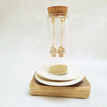Load image into Gallery viewer, Gold Hamsa Oval Hoop Earrings in a Bottle - Zamsoe