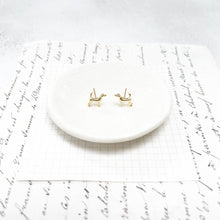 Load image into Gallery viewer, Gold Dog and Paw Print Stud Earrings With a Hand-Drawn Illustration in a Glass Dome.