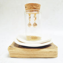 Load image into Gallery viewer, Gold Shell Huggie Earrings in a bottle - Zamsoe