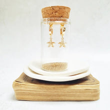 Load image into Gallery viewer, Gold Starfish Huggie Earrings in a bottle - Zamsoe