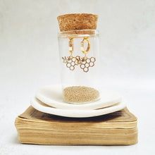 Load image into Gallery viewer, Bee and Honeycomb Gold Huggie Earrings in a bottle
