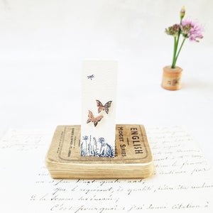 Classic butterfly stud earrings in a bottle