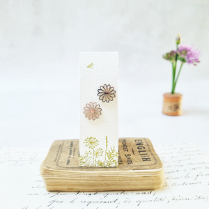 Classic daisy stud earrings in a bottle