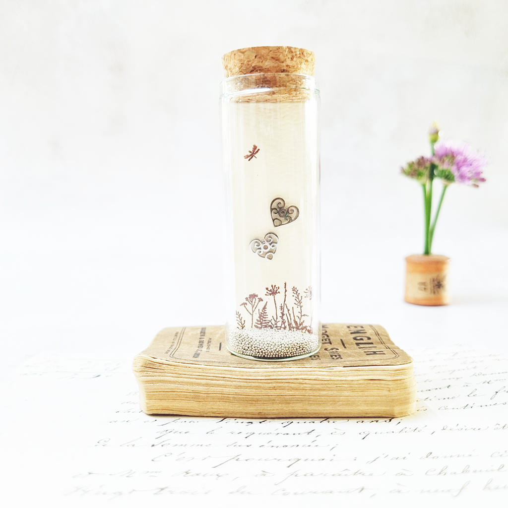 Classic filigree heart stud earrings in a bottle