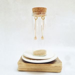 Gold Flower Oval Hoop Earrings in a Bottle