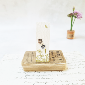 Classic flower stud earrings in a bottle