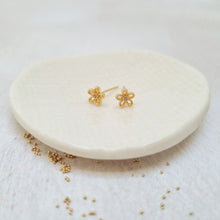 Load image into Gallery viewer, Gold daisy flower stud earrings in a bottle
