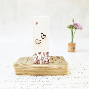 Classic heart stud earrings in a bottle