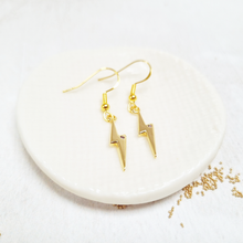 Load image into Gallery viewer, Gold Lightening Bolt Fish Hook Earrings in a Bottle
