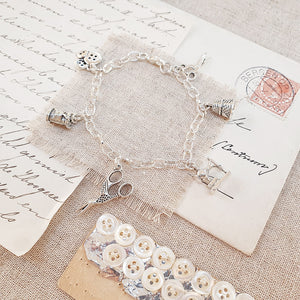 Sewing Five Charm Silver Plated Bracelet