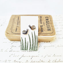 Load image into Gallery viewer, Gardeners snail earrings in a bottle
