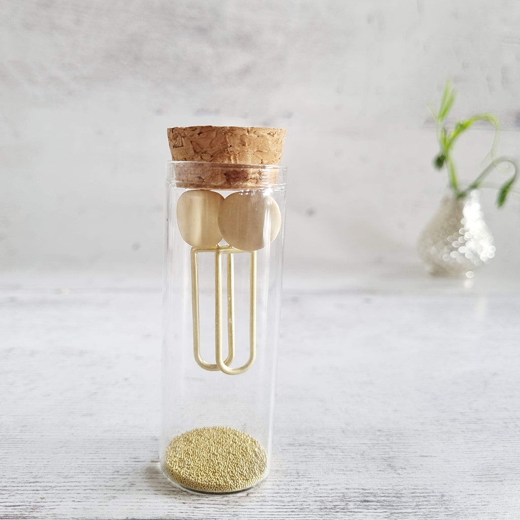 Circle and Oval Gold Earrings in a Bottle